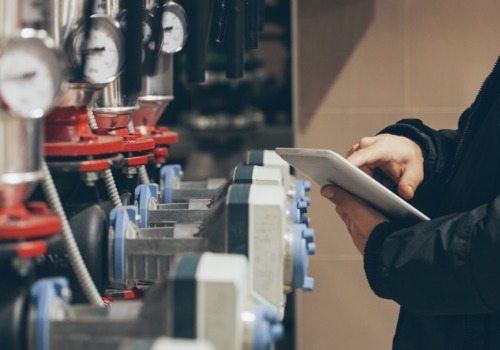 Man Examining Industrial Boilers in Illinois